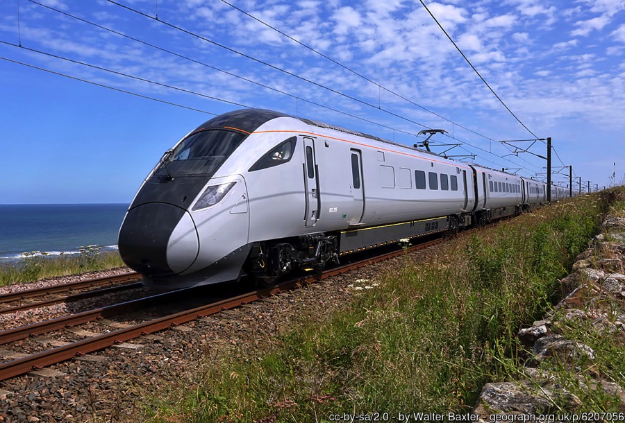Train travelling along a coastline